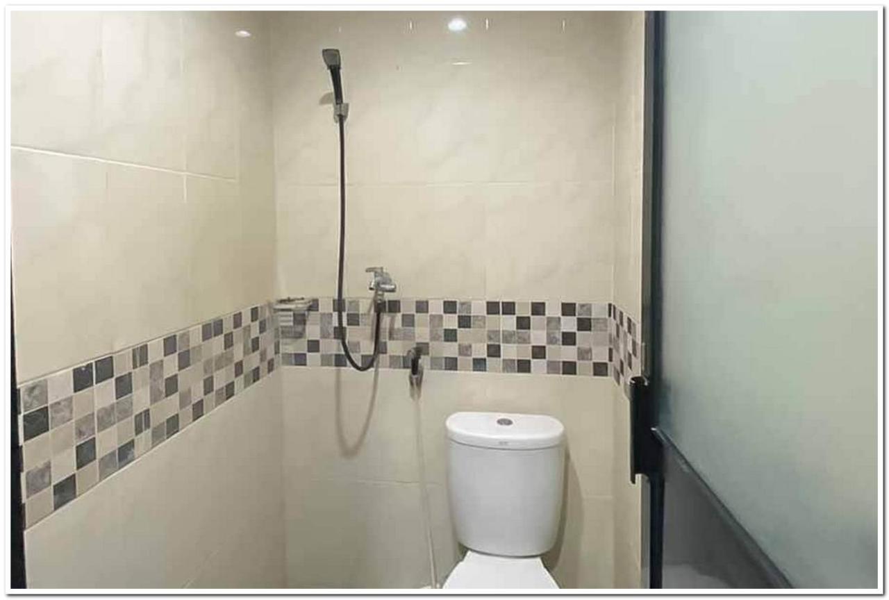 Losmen Family Syariah Bypass Juanda Mitra Reddoorz Brebek Екстер'єр фото