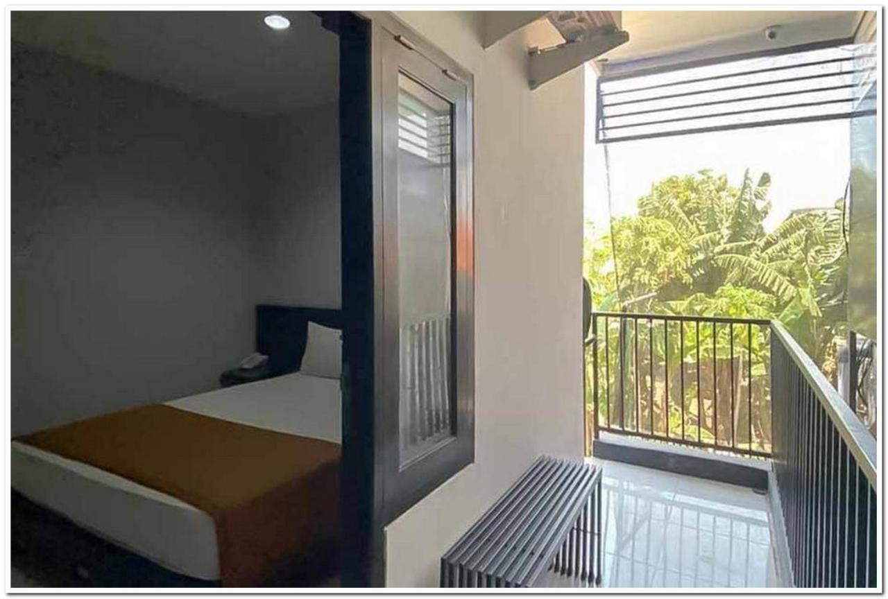 Losmen Family Syariah Bypass Juanda Mitra Reddoorz Brebek Екстер'єр фото